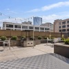 rooftop patio with chairs and seating